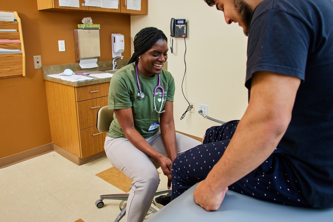 A doctor helping a patient

AI-generated content may be incorrect., Picture