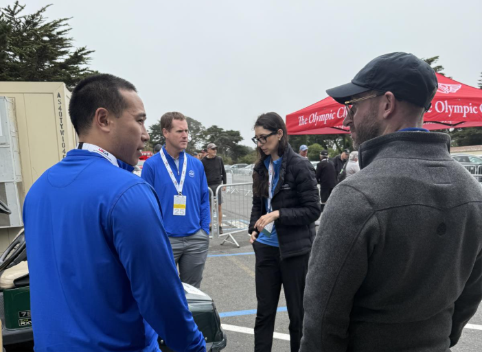 four people in a circle