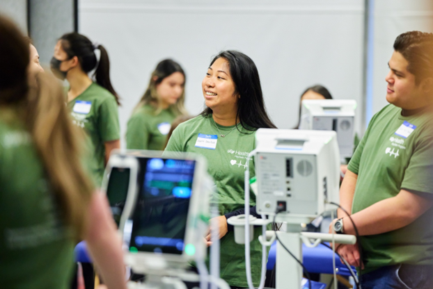 A group of people in green t-shirts

AI-generated content may be incorrect., Picture