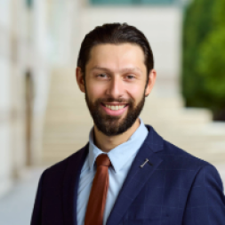 Headshot of Julian Rizos, MD