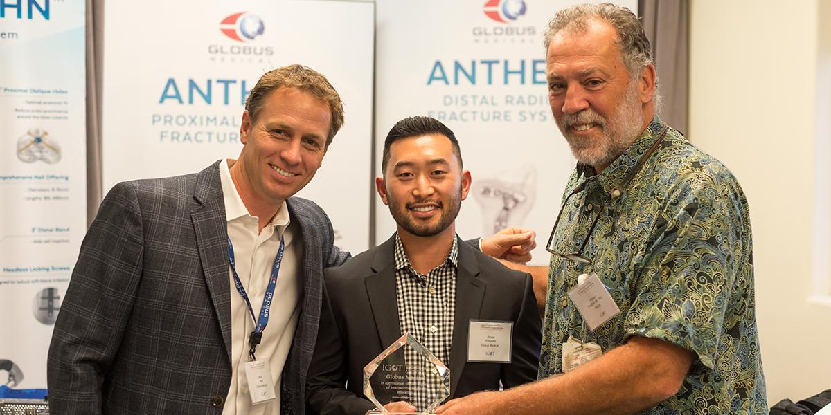 award with 3 men