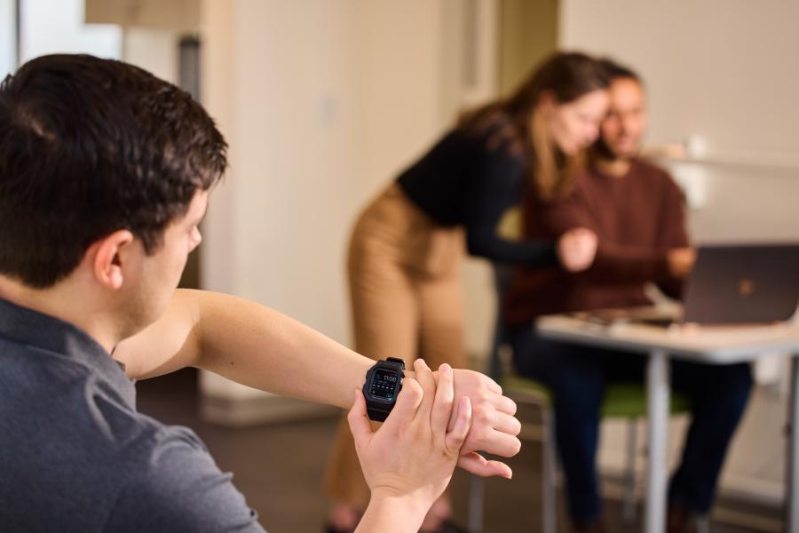 Man looking at watch