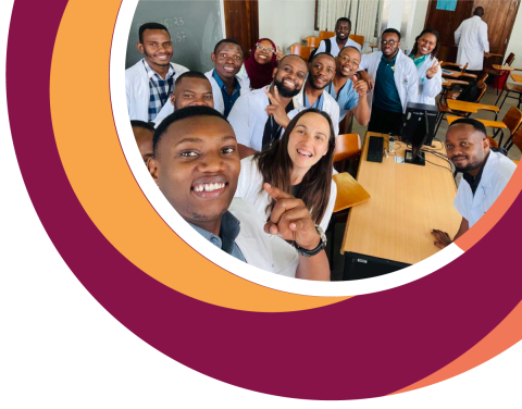 group of happy people in a circle with colored strokes