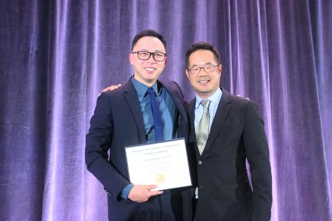 Hand fellowship director, Nicolas Lee, MD, (right) presented a fellowship graduation certificate to hand fellow, Scott Liu, MD. 
