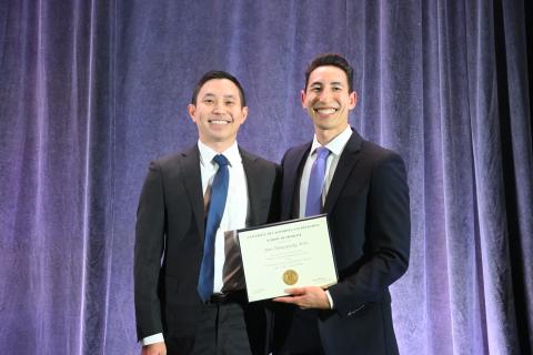 Primary care sports medicine fellowship director, Nicolas Hatamiya, DO, (left) presented a fellowship graduation certificate to primary care sports medicine fellow, Alan Grusky, MD. (Photo: UCSF Department of Orthopaedic Surgery)