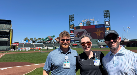 three playsafe program staff pose at oracle park