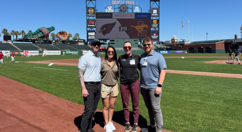 four playsafe program staff pose at oracle park