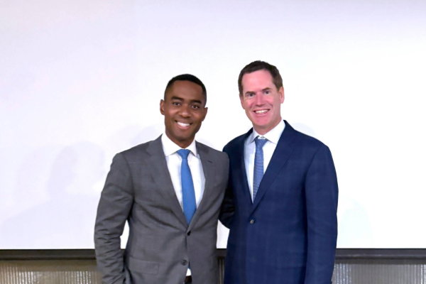 Wiggins and Lansdown pose for a photo at Grand Rounds