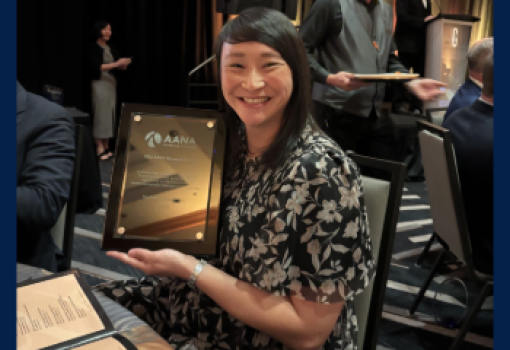 thumbnail Stephanie Wong holding award